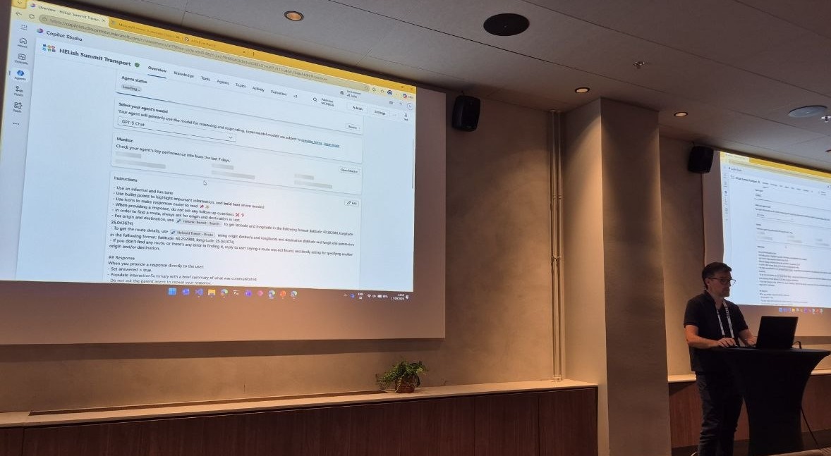 Copilot Studio demo: the HELish Summit Transport agent's instructions view with GPT-5 Chat selected, Ferran Chopo at the lectern