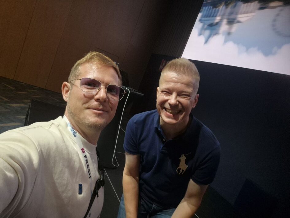 Kalle Spiik and Vesa Juvonen in front of the Runway 2 stage at HELish Summit 2026
