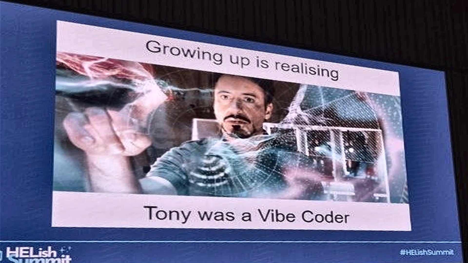Slide: Growing up is realising Tony was a vibe coder, Iron Man meme