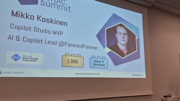 Mikko Koskinen, Copilot Studio MVP and AI and Copilot Lead at Forward Forever, at the lectern in the Ideas room at Nordic Summit 2026 with his intro slide