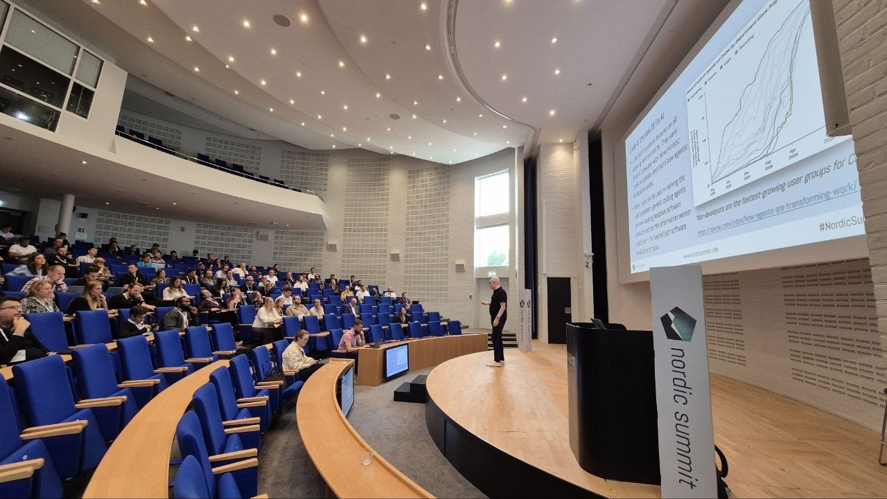 The Duplo hall at Nordic Summit 2026 during Jukka Niiranen's deep dive, slide showing OpenAI's chart of non-developers as the fastest growing Codex user group
