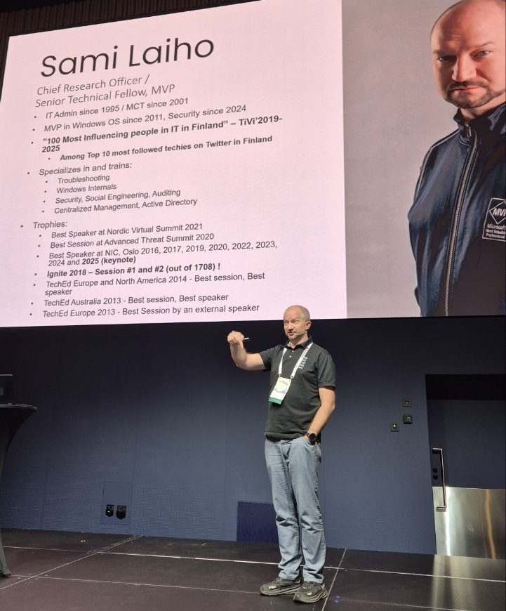 Sami Laiho in front of his bio slide: Chief Research Officer and Senior Technical Fellow, IT admin since 1995, MVP Windows OS since 2011 and Security since 2024, speaker awards at Ignite, TechEd and NIC