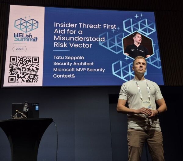 Tatu Seppala on stage at HELish Summit 2026 next to his title slide, Insider Threat: First Aid for a Misunderstood Risk Vector