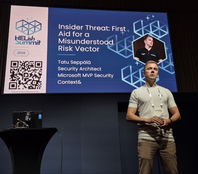 Tatu Seppala on stage at HELish Summit 2026 next to his title slide, Insider Threat: First Aid for a Misunderstood Risk Vector